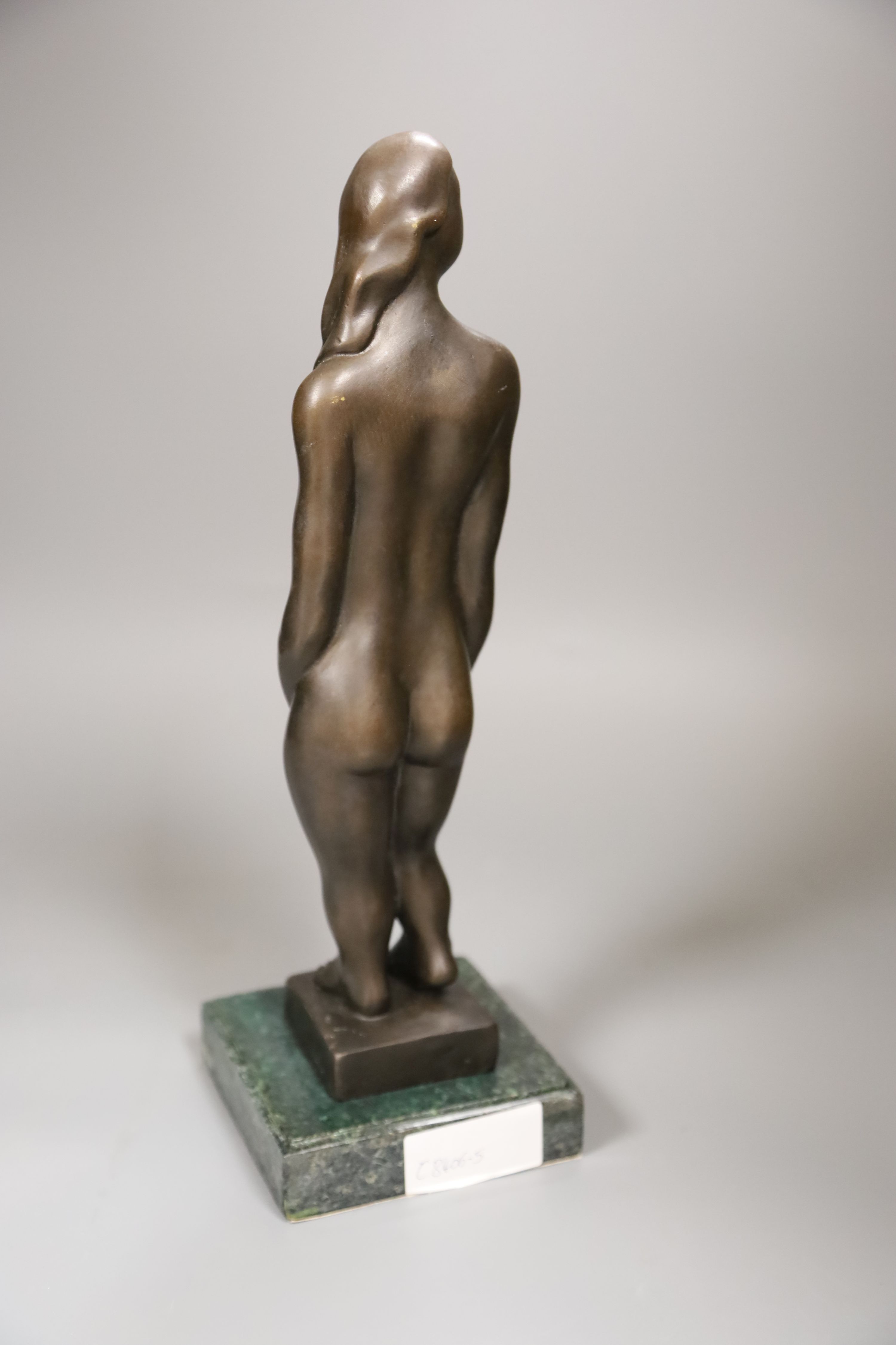 An abstract bronze of a nude lady, height 25cm